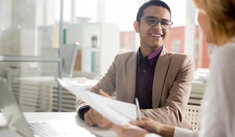 Business people discussing business plans together. Man talking with woman