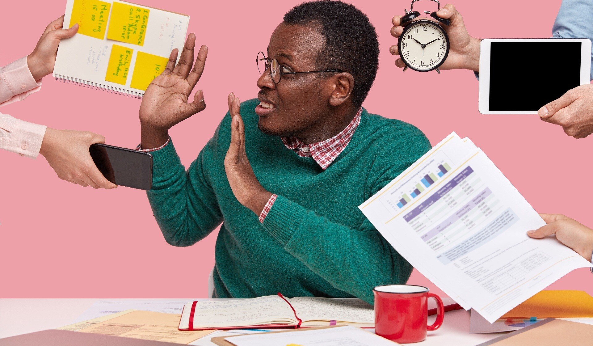 Stressed man has much work in office, asked by many people at one time to do tasks