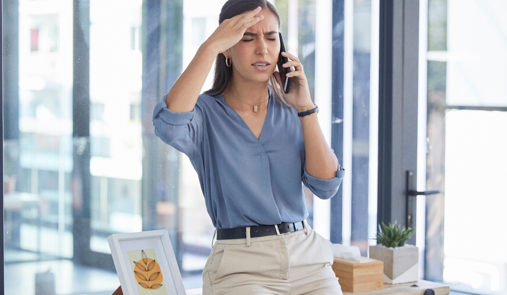 Work stress, business woman with headache and feeling anxiety. 